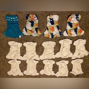 10 esembly size one inners and 4 outer cloth diapers